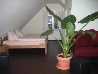 Ein Bett oder Betten in einem Zimmer der Unterkunft Gästehaus Oswald