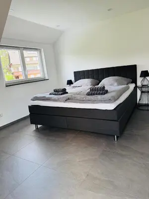 Ein Bett oder Betten in einem Zimmer der Unterkunft Ankommen, Wohlfühlen! - FeWo Schömberg