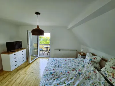 Ein Bett oder Betten in einem Zimmer der Unterkunft Maison Robichon