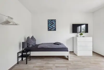 Ein Bett oder Betten in einem Zimmer der Unterkunft BIR01 Work & Stay in Rüsselsheim
