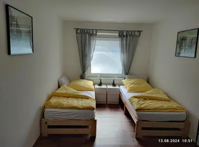 Ein Bett oder Betten in einem Zimmer der Unterkunft Schleusenapartment mit Klimaanlage und Kamin