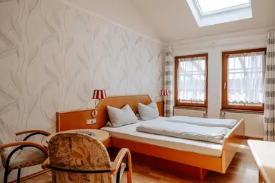 Ein Bett oder Betten in einem Zimmer der Unterkunft Weingut Zimmermann