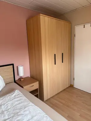 Ein Bett oder Betten in einem Zimmer der Unterkunft Gemütliche Ferienwohnung in Rödermark