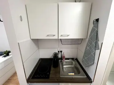 Küche/Küchenzeile in der Unterkunft Zentrales City-Studio in Mannheimer Innenstadt