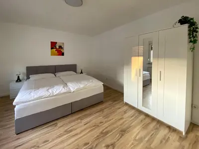 Ein Bett oder Betten in einem Zimmer der Unterkunft Apartment Bourquin