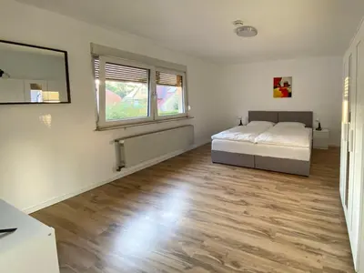 Ein Bett oder Betten in einem Zimmer der Unterkunft Apartment Bourquin