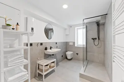 Ein Badezimmer in der Unterkunft TOP Apartments - Stilvolle Wohnung mit Loggia im Stadtzentrum - Kingsize Bett - Smart TV - Netflix - 60qm - 24h Check-In