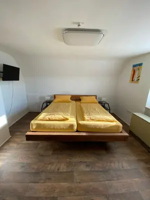 Ein Bett oder Betten in einem Zimmer der Unterkunft Ferienwohnung Altrip