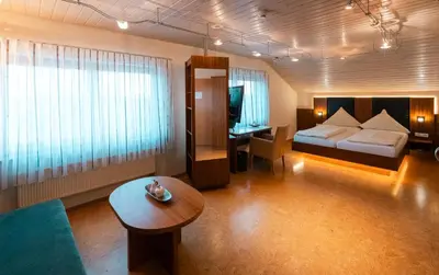 Ein Bett oder Betten in einem Zimmer der Unterkunft Gästehaus Kraft