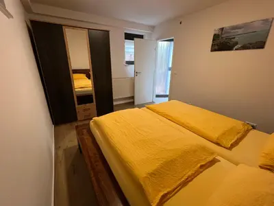 Ein Bett oder Betten in einem Zimmer der Unterkunft Casa Rosa Ferienwohnung in Altrip
