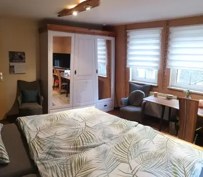 Ein Bett oder Betten in einem Zimmer der Unterkunft FeWo an der Enz