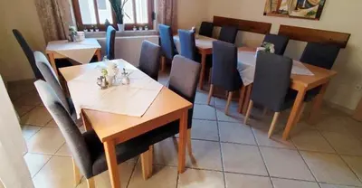 Ein Sitzbereich in der Unterkunft Pension Zur Schlummerstube