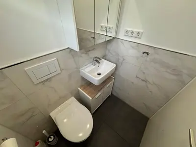 Ein Badezimmer in der Unterkunft Zimmer mit gemeinschaftsbad