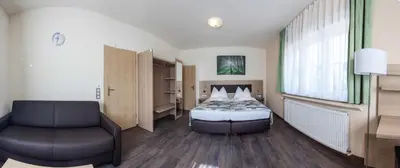 Ein Bett oder Betten in einem Zimmer der Unterkunft Hotel Lorca