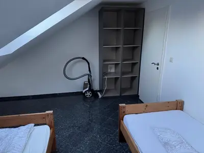 Ein Bett oder Betten in einem Zimmer der Unterkunft Comfort Apartments Heilbronn Kreuzgrund