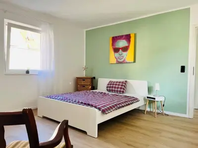 Ein Bett oder Betten in einem Zimmer der Unterkunft Renovierte Remise mit 3 Schlafzlmmern