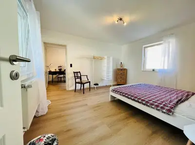 Ein Bett oder Betten in einem Zimmer der Unterkunft Renovierte Remise mit 3 Schlafzlmmern
