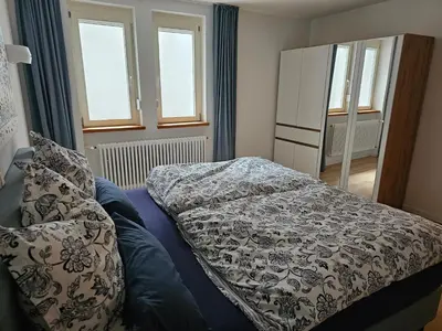 Ein Bett oder Betten in einem Zimmer der Unterkunft Ferienwohnung Sieben Raben
