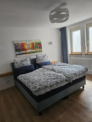 Ein Bett oder Betten in einem Zimmer der Unterkunft Ferienwohnung Sieben Raben