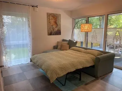 Ein Bett oder Betten in einem Zimmer der Unterkunft Sonnenbergs Quartier