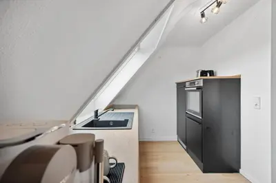 Küche/Küchenzeile in der Unterkunft Malu Rooms - Top Lage, Kostenloser Parkplatz, Klima, Netflix, 24h Checkin