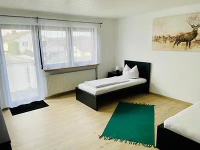 Ein Bett oder Betten in einem Zimmer der Unterkunft Panoramablick Ferien- und Monteurwohnung OG