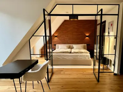 Ein Bett oder Betten in einem Zimmer der Unterkunft theLOFT