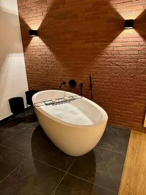 Ein Badezimmer in der Unterkunft theLOFT