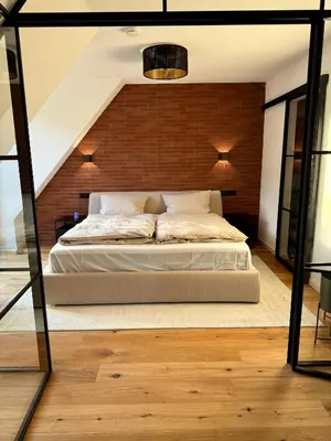 Ein Bett oder Betten in einem Zimmer der Unterkunft theLOFT