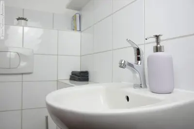 Ein Badezimmer in der Unterkunft Moderne 3-Zimmer-Wohnung für bis zu 7 Personen