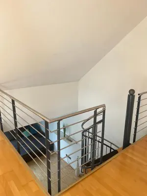 Ein Bett oder Betten in einem Zimmer der Unterkunft Schicke helle Galeriewohnung