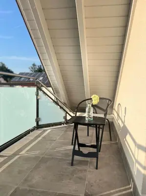 Ein Balkon oder eine Terrasse in der Unterkunft Schicke helle Galeriewohnung