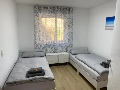Ein Bett oder Betten in einem Zimmer der Unterkunft Sunny Suite mit Balkon - Küche - Bad