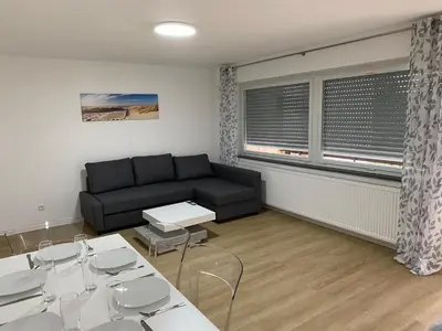 Ein Sitzbereich in der Unterkunft Sunny Suite mit Balkon - Küche - Bad