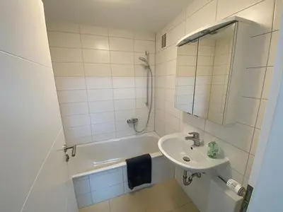 Ein Badezimmer in der Unterkunft Sunny Suite mit Balkon - Küche - Bad
