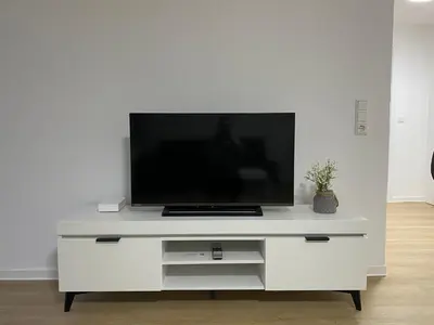 TV/Unterhaltungsangebot in der Unterkunft Sunny Suite mit Balkon - Küche - Bad