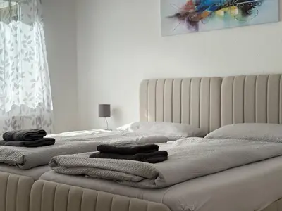 Ein Bett oder Betten in einem Zimmer der Unterkunft Garden Retreat - Küche - Bad - Garten