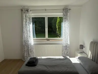 Ein Bett oder Betten in einem Zimmer der Unterkunft Garden Retreat - Küche - Bad - Garten