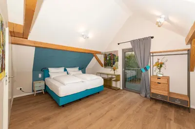 Ein Bett oder Betten in einem Zimmer der Unterkunft Ada's Buka Chalet auf dem Felsberg