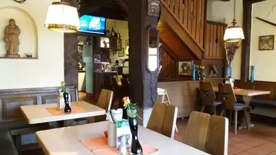 Ein Sitzbereich in der Unterkunft Gasthof Stadtschänke