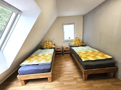 Ein Bett oder Betten in einem Zimmer der Unterkunft Ferienwohnung Heilbronn