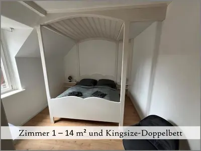 Ein Bett oder Betten in einem Zimmer der Unterkunft Gästehaus Reibold