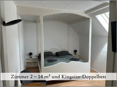 Ein Bett oder Betten in einem Zimmer der Unterkunft Gästehaus Reibold