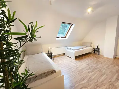 Ein Bett oder Betten in einem Zimmer der Unterkunft Chic Apartments in idyllic location