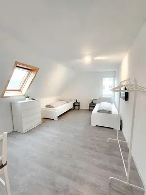 Ein Bett oder Betten in einem Zimmer der Unterkunft Chic Apartments in idyllic location