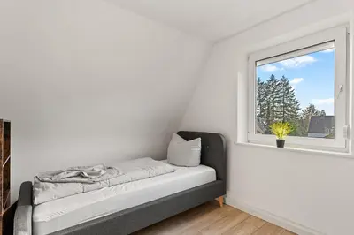 Ein Bett oder Betten in einem Zimmer der Unterkunft BRAVURA - modern - bis zu 6 - Nähe Hambacher Schloss
