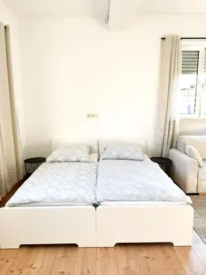 Ein Bett oder Betten in einem Zimmer der Unterkunft Family and Business Apartments Mannheim Three