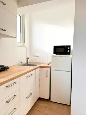 Küche/Küchenzeile in der Unterkunft Family and Business Apartments Mannheim Three