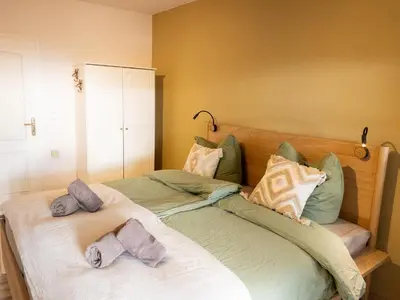 Ein Bett oder Betten in einem Zimmer der Unterkunft Großes Glück im Waldglück Pfalz