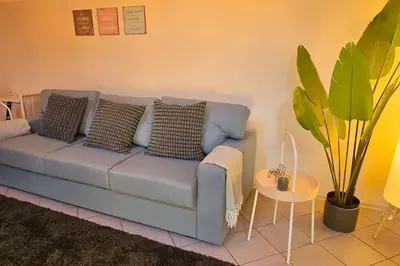 Ein Sitzbereich in der Unterkunft Appartment Mutterstadt Oase - MIS